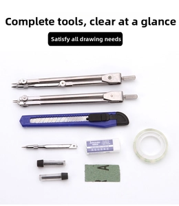 Flat lay of engineering drawing set with metal compasses, cutter, and drafting accessories