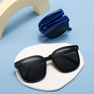 Foldable kids sunglasses in black and blue colors with UV protection and large frames
