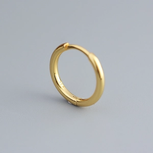Elegant gold S925 sterling silver hoop earrings with a minimalist polished round design
