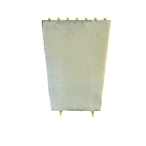 Golden metal jewelry display rack with light gray velvet backing for earrings and necklaces