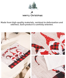 Detailed view of Christmas gnome placemat with Merry Christmas print and tartan border
