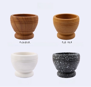 Collage of pestle and mortar sets in wood grain, white ceramic, and granite textures