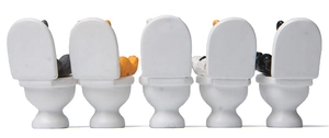 Row of five miniature cats on toilets featuring colorful grey, orange and black kittens