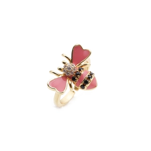 Detail of 18K gold-plated bee ring with pink enamel wings and micro-inset zircons