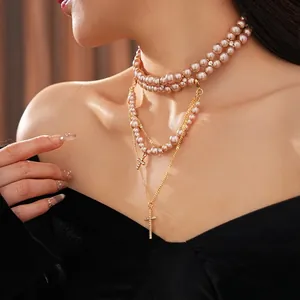 Double-layered champagne pearl choker with crystal cross pendants for women
