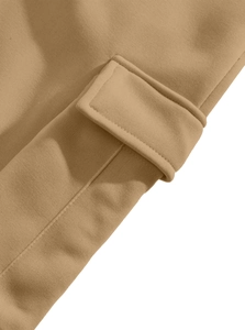 Detailed close-up of khaki cargo pocket flap showing high-quality stitching and fabric