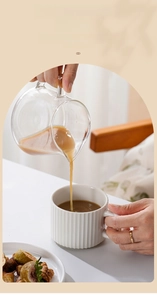 Close-up of pouring coffee into a white ceramic cup with Roman vertical stripes texture