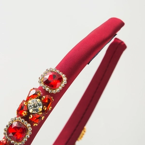 Sparkling red satin wide headband with rhinestones and ruby-colored crystals