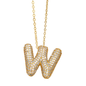 Detailed close-up of golden puffy letter W pendant with sparkling white cubic zirconia