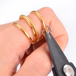 DIY stainless steel jump rings and gold textured rings with jewelry pliers demonstration