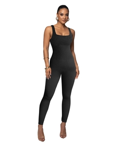 Close-up of black ribbed texture on a square neck sleeveless compression yoga jumpsuit