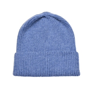 Close-up of a light blue ribbed knit beanie featuring a wide cuff and soft texture