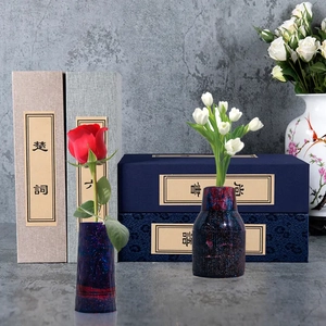 Detail of two-piece dark blue star-patterned vases with fine vertical stripe base