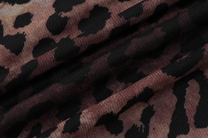 Close-up of the leopard print mesh fabric texture on the sexy leopard bodycon dress