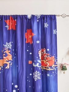 Detail of Christmas curtain featuring Santa and reindeer on a deep blue fabric