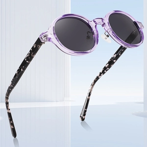 Stylish round sunglasses with purple transparent frame and tortoiseshell polarized lenses