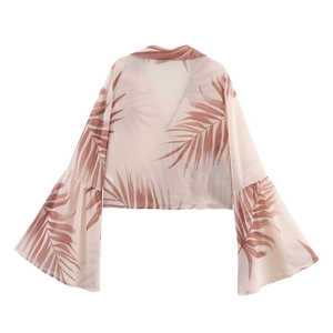 Women's V-neck chiffon top with palm leaf print and wide bell sleeves for beach vacations