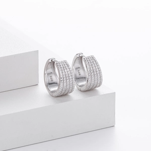 Minimalist S925 sterling silver hoop earrings with micro-inlaid zircon on white display