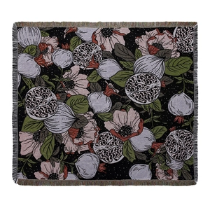 Nordic woven throw blanket featuring vintage pomegranate floral patterns with colorful tassels