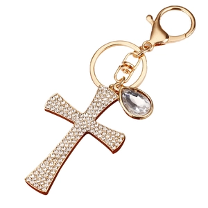 Golden rhinestone cross keychain with sparkling teardrop pendant for elegant handbags