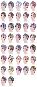Matrix display of multi-pattern ethnic headscarves and turban hats on mannequin heads