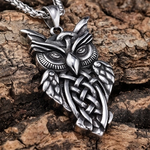 Retro Viking owl pendant in stainless steel with Celtic knot details on tree bark