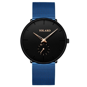 Macro shot of black dial watch with blue mesh band and rose gold hands by Yolako