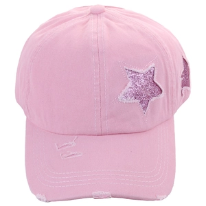 Detail of pink cotton baseball cap with sequined star patch and distressed torn effect