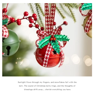 Macro shot of red Christmas bell with houndstooth ribbon and berry details on tree