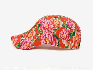 Side view of traditional red floral beret featuring peony patterns and ethnic style