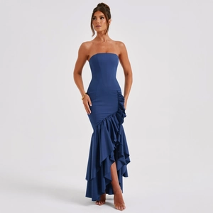 Close-up of strapless navy evening dress with asymmetrical layered ruffle hemline