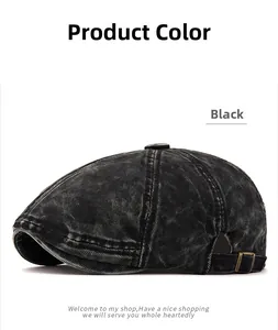 Detail of vintage washed black denim beret hat with adjustable metal buckle and stitching