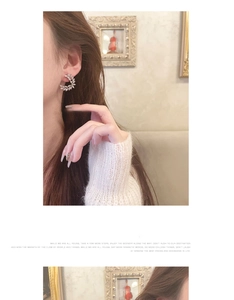 Elegant model shot of silver wheat ear earrings with marquise-cut cubic zirconia studs