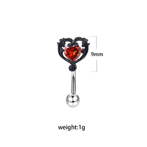 Gothic punk navel piercing with silver curved bar and red heart zircon pendant