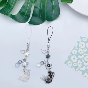 Handmade koi fish and star beaded phone charms in black and white styles with metal chains