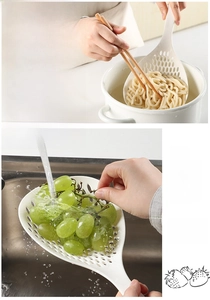 Japanese long-handle skimmer ladle draining noodles and washing grapes in a kitchen sink