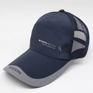 Detail of navy quick-dry sports cap showing breathable mesh and Modern British text