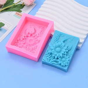 Pink silicone sunflower mold with finished blue crafts for cake fondant and soap DIY