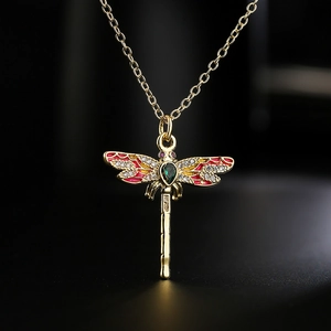 18K gold plated dragonfly necklace with red enamel wings and green gemstone pendant