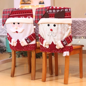 Detail of Christmas chair covers featuring Santa and reindeer with 3D appliques