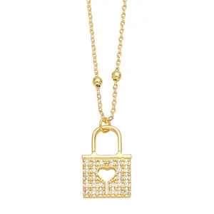 Minimalist gold heart lock pendant necklace with pavé stones and metal beads