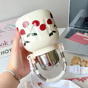 Leakproof 316 stainless steel kids thermos with cherry pattern and shoulder strap
