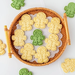Gingerbread man cookie mold set with cute expressions for festive holiday baking DIY projects