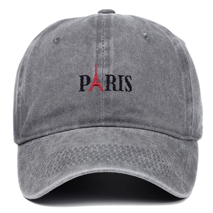 Washed dark grey baseball cap featuring Paris embroidery with red Eiffel Tower icon