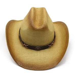Western style straw cowboy hat with a bull head badge on a brown leather band