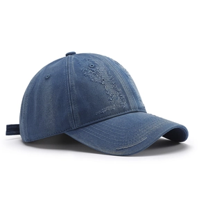 Vintage dark blue washed denim baseball cap with distressed details in 45-degree side view