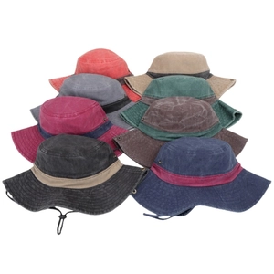 Stacked washed cotton boonie hats in multiple colors for outdoor sun protection