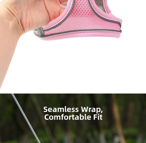 Detail of breathable pink mesh pet harness with grey reflective safety strips
