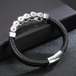 Men's punk braided leather bracelet with silver gear accents and magnetic clasp