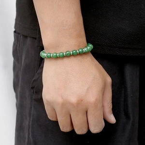 Green natural stone beaded bracelet with 8mm tiger eye beads and silver metal spacers